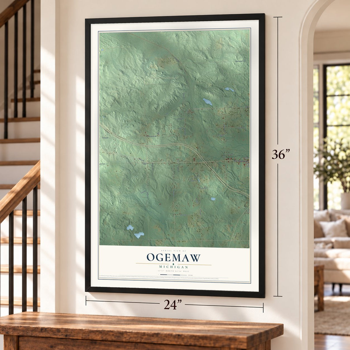 Ogemaw, Michigan map, 24 x 36 inch print in a black frame by a staircase