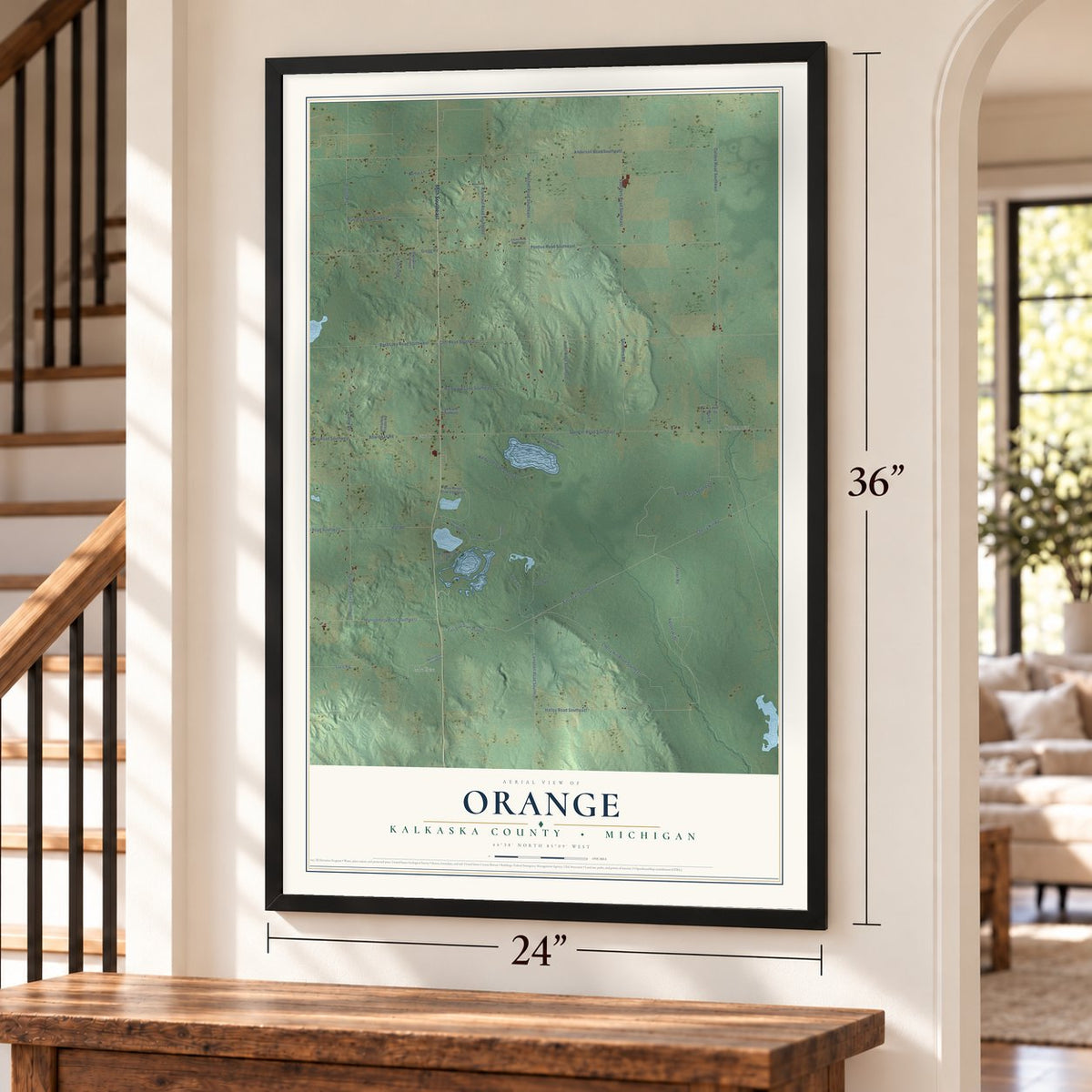 Orange, Kalkaska County, Michigan map, 24 x 36 inch print in a black frame by a staircase