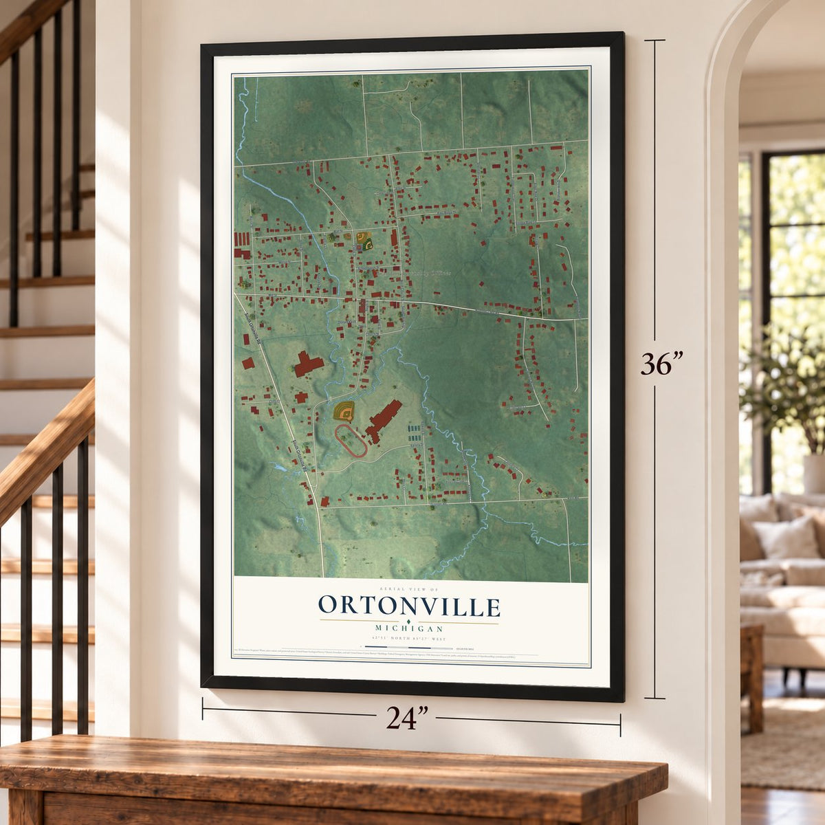 Ortonville, Michigan map, 24 x 36 inch print in a black frame by a staircase
