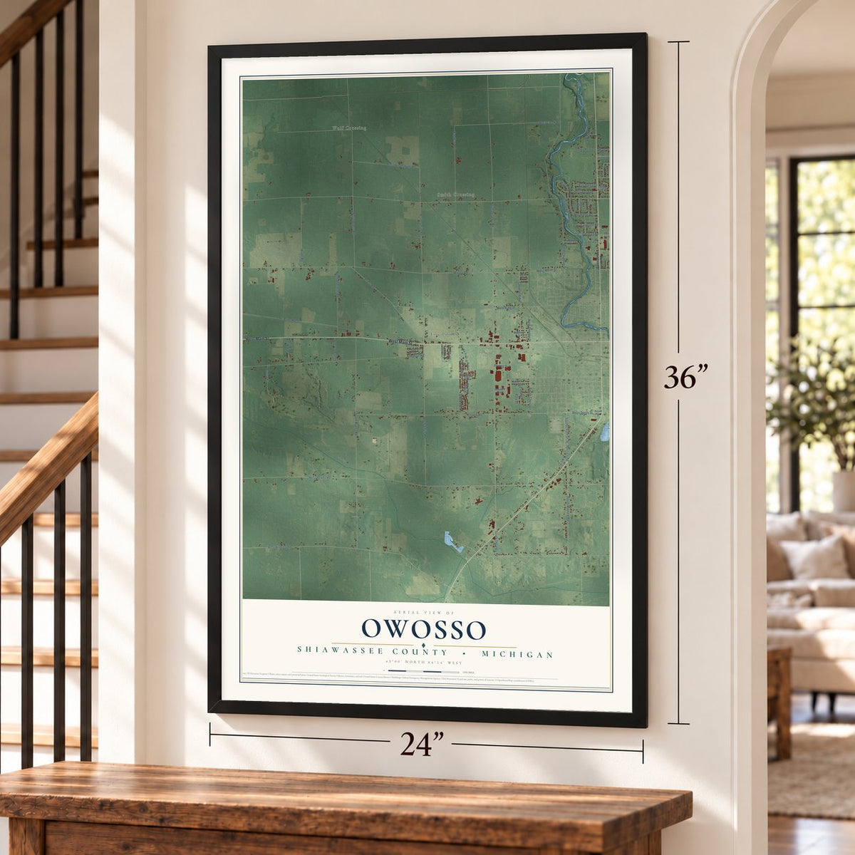 Owosso, Shiawassee County, Michigan map, 24 x 36 inch print in a black frame by a staircase