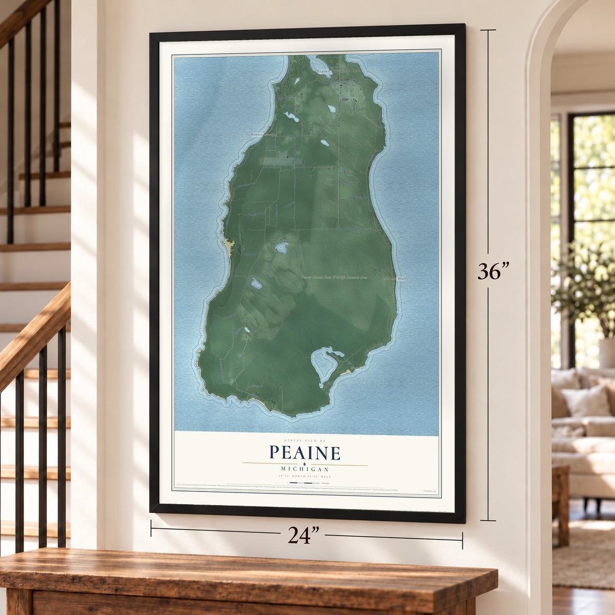 Peaine, Michigan map, 24 x 36 inch print in a black frame by a staircase