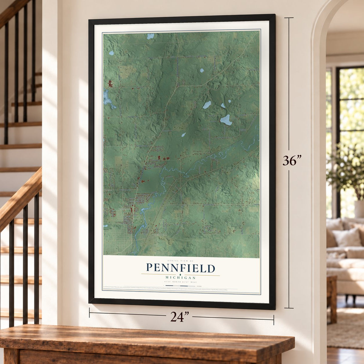 Pennfield, Michigan map, 24 x 36 inch print in a black frame by a staircase