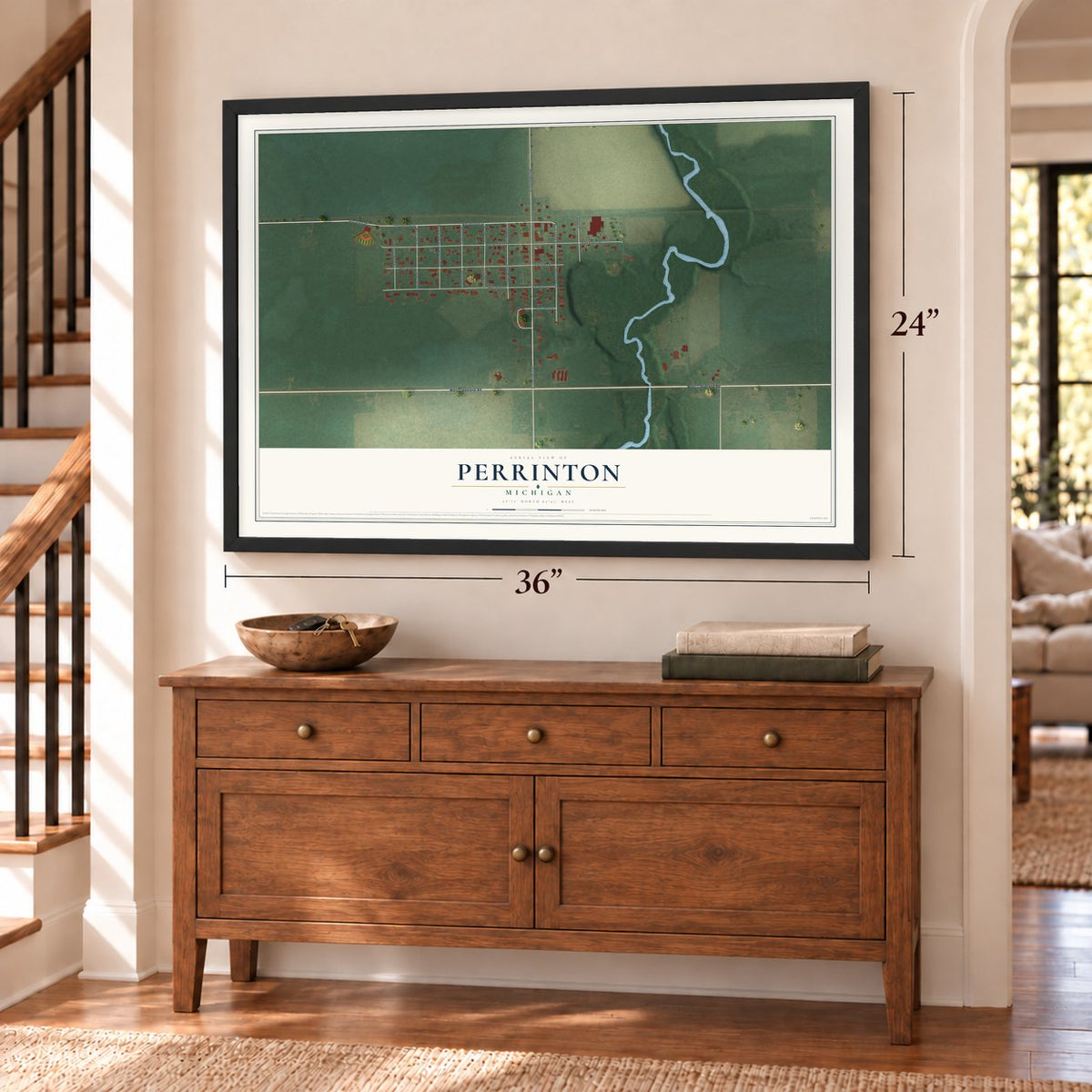 Perrinton, Michigan map, 24 x 36 inch print in a black frame above a dresser by a staircase