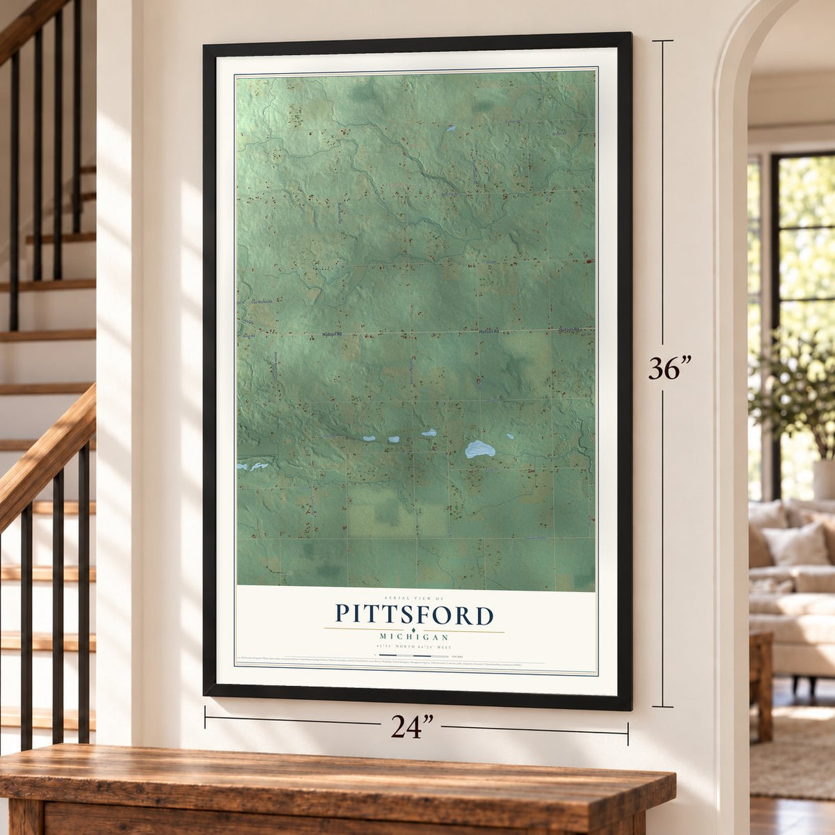 Pittsford, Michigan map, 24 x 36 inch print in a black frame by a staircase