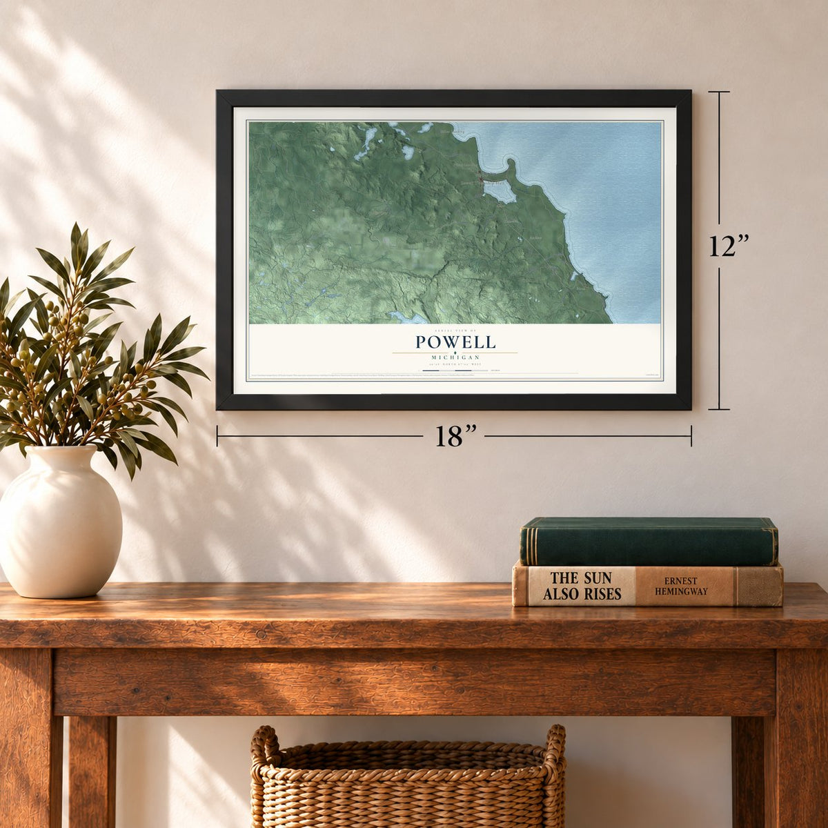 Powell, Michigan map, 12 x 18 inch print in a black frame in an entryway