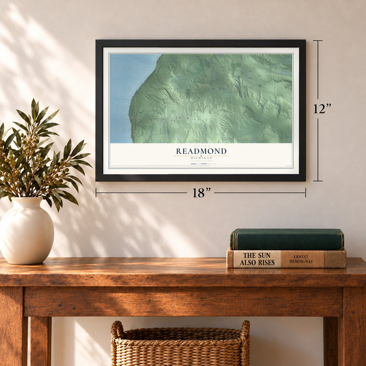 Readmond, Michigan map, 12 x 18 inch print in a black frame in an entryway