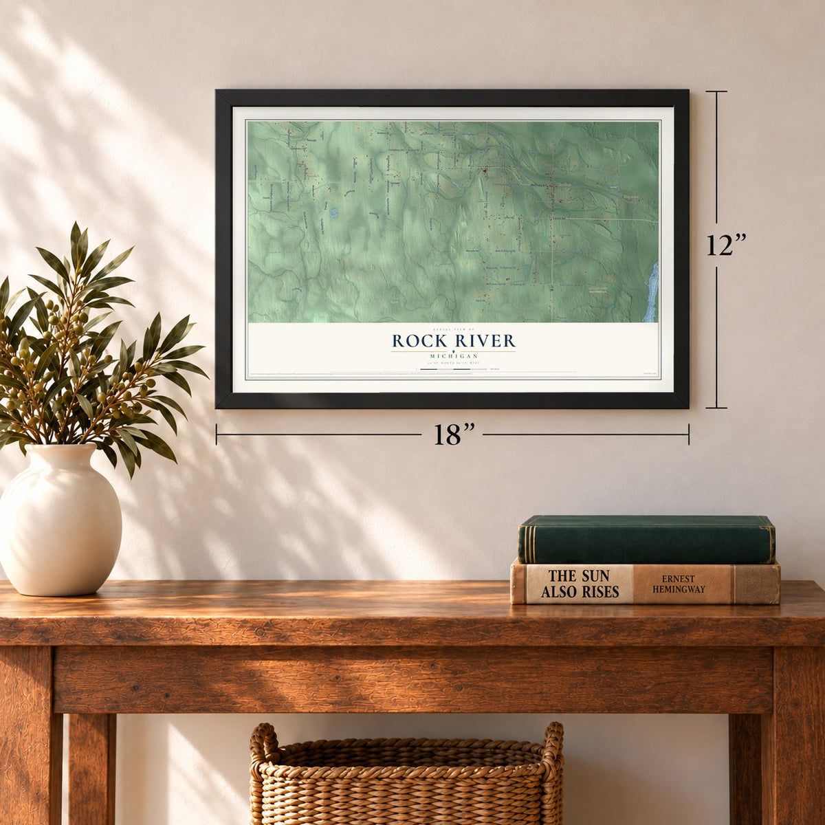 Rock River, Michigan map, 12 x 18 inch print in a black frame in an entryway