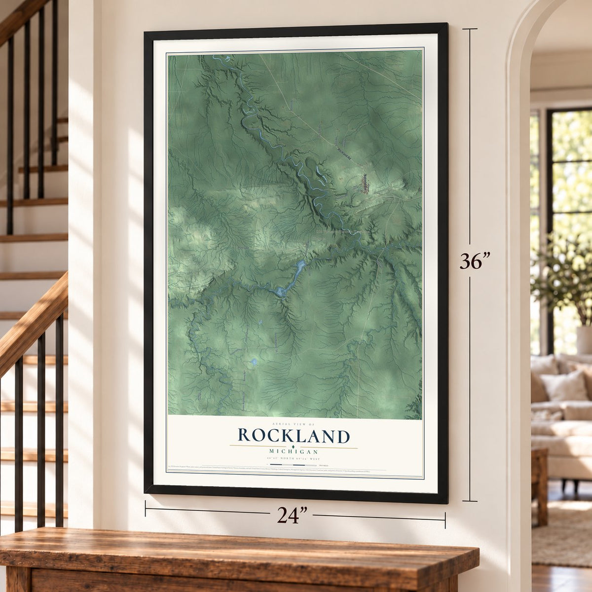 Rockland, Michigan map, 24 x 36 inch print in a black frame by a staircase
