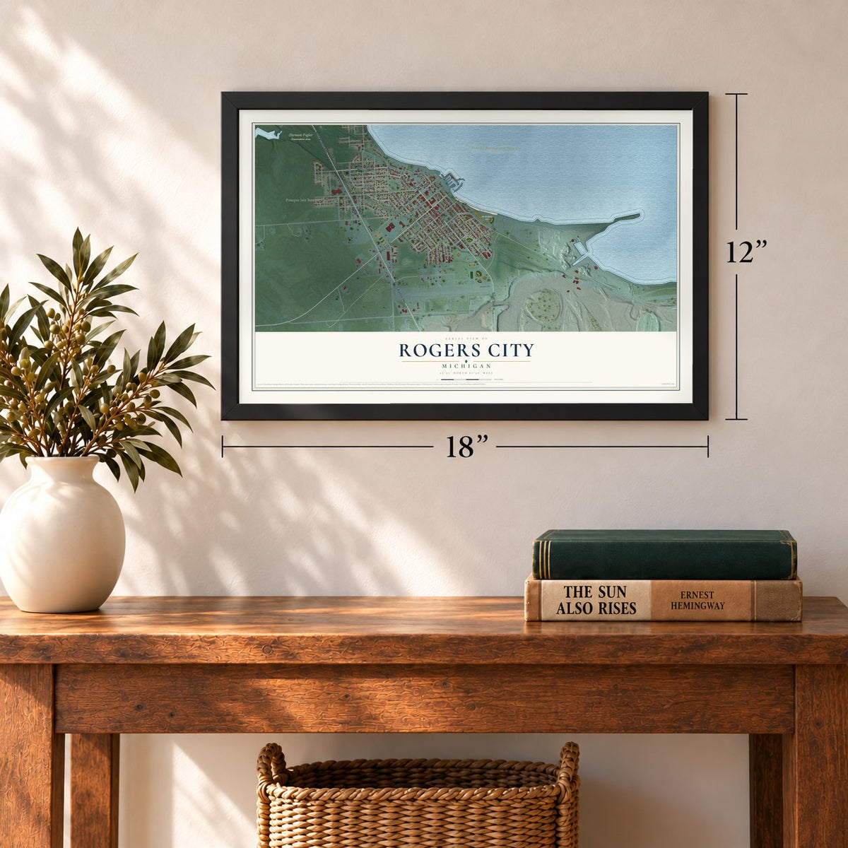 Rogers City, Michigan map, 12 x 18 inch print in a black frame in an entryway