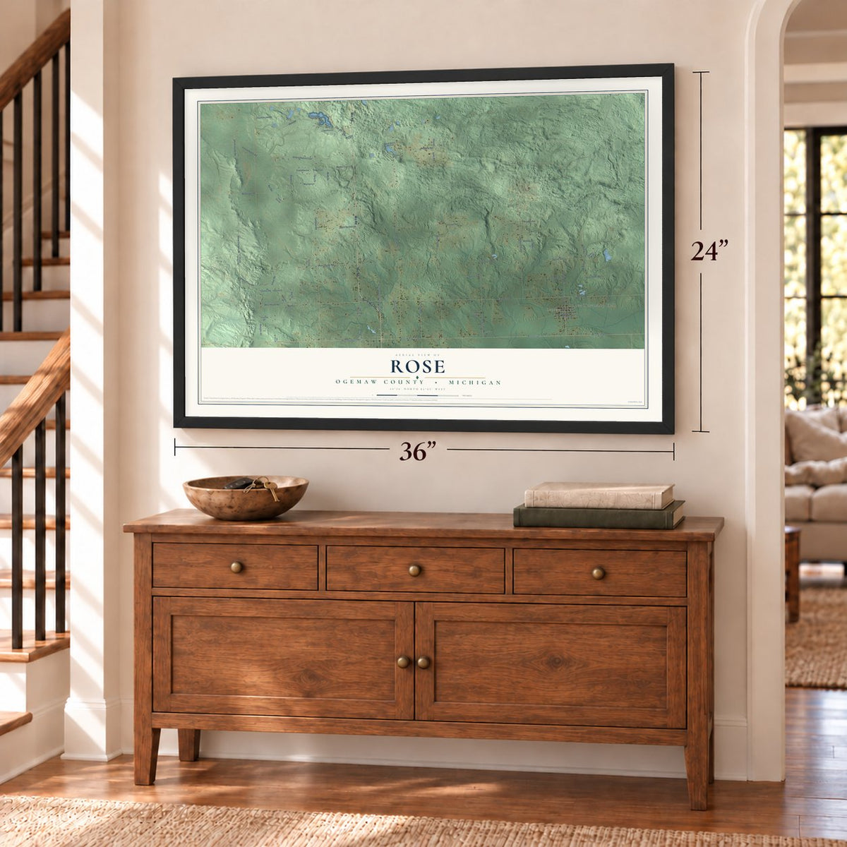 Rose, Ogemaw County, Michigan map, 24 x 36 inch print in a black frame above a dresser by a staircase