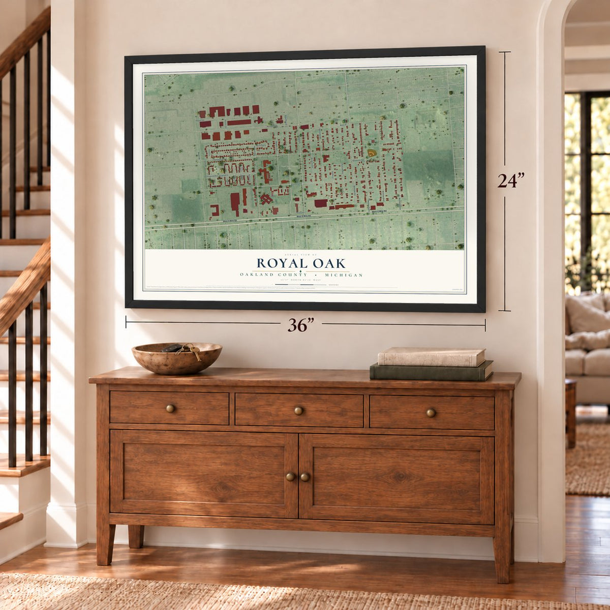 Royal Oak, Oakland County, Michigan map, 24 x 36 inch print in a black frame above a dresser by a staircase