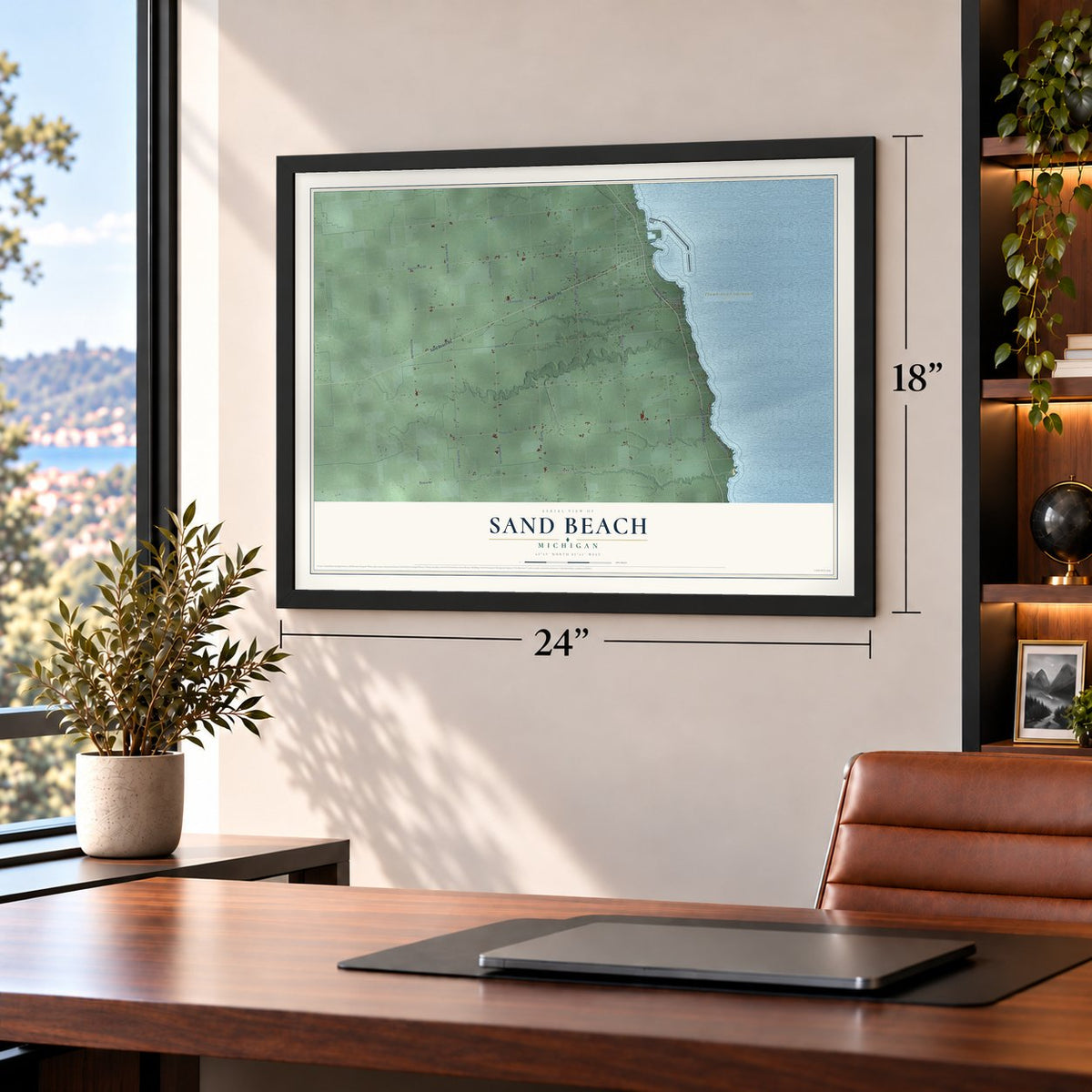 Sand Beach, Michigan map, 18 x 24 inch print in a black frame in a home office