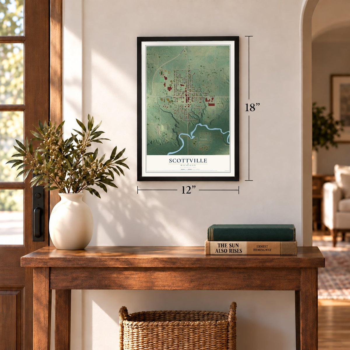 Scottville, Michigan map, 12 x 18 inch print in a black frame in an entryway
