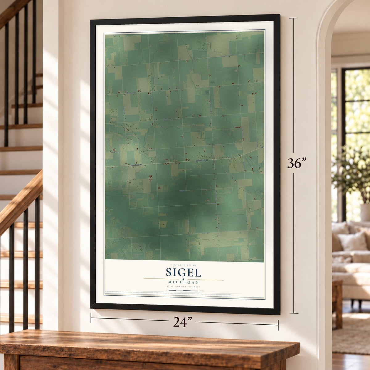 Sigel, Michigan map, 24 x 36 inch print in a black frame by a staircase