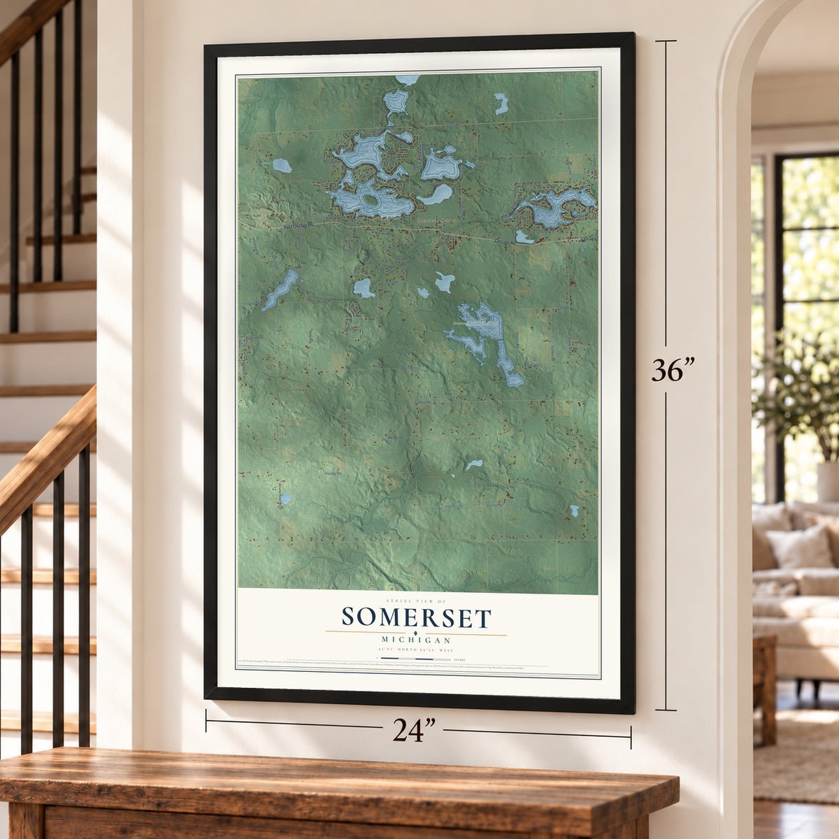 Somerset, Michigan map, 24 x 36 inch print in a black frame by a staircase