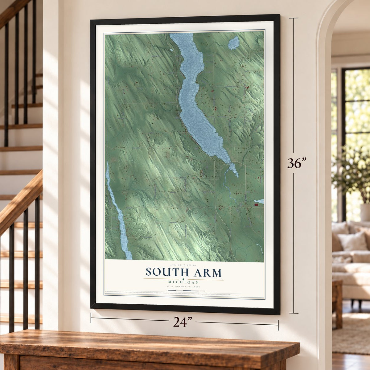 South Arm, Michigan map, 24 x 36 inch print in a black frame by a staircase