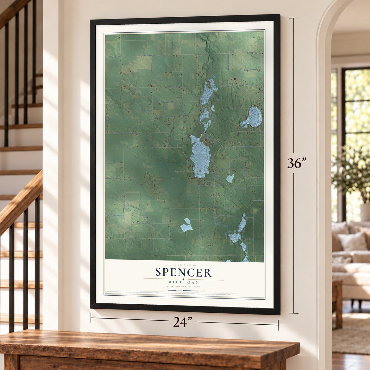 Spencer, Michigan map, 24 x 36 inch print in a black frame by a staircase