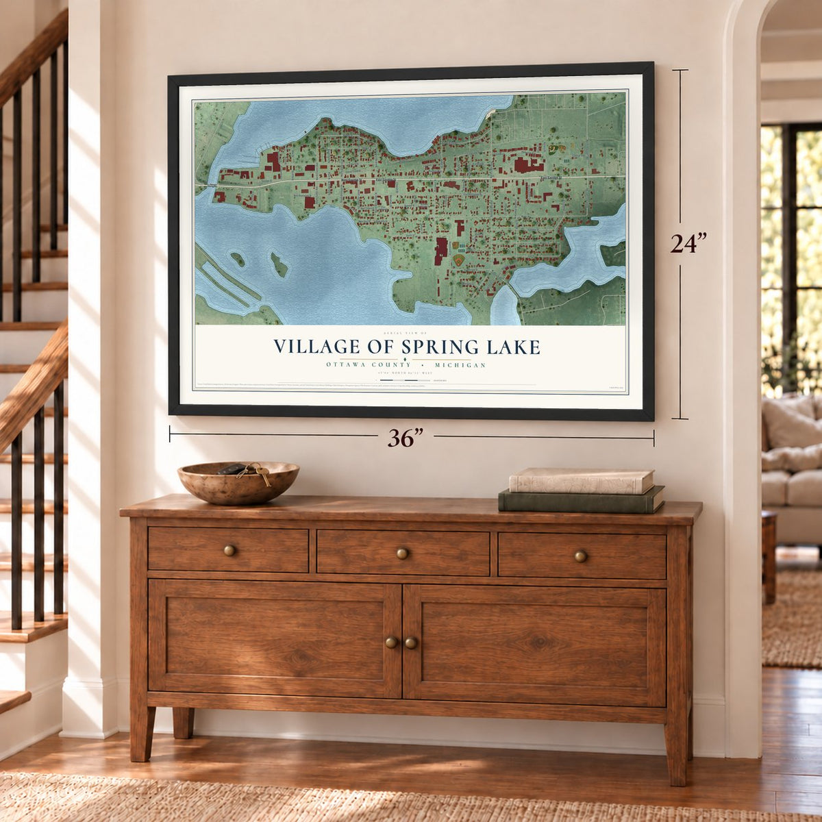 Spring Lake, Michigan map, 24 x 36 inch print in a black frame above a dresser by a staircase