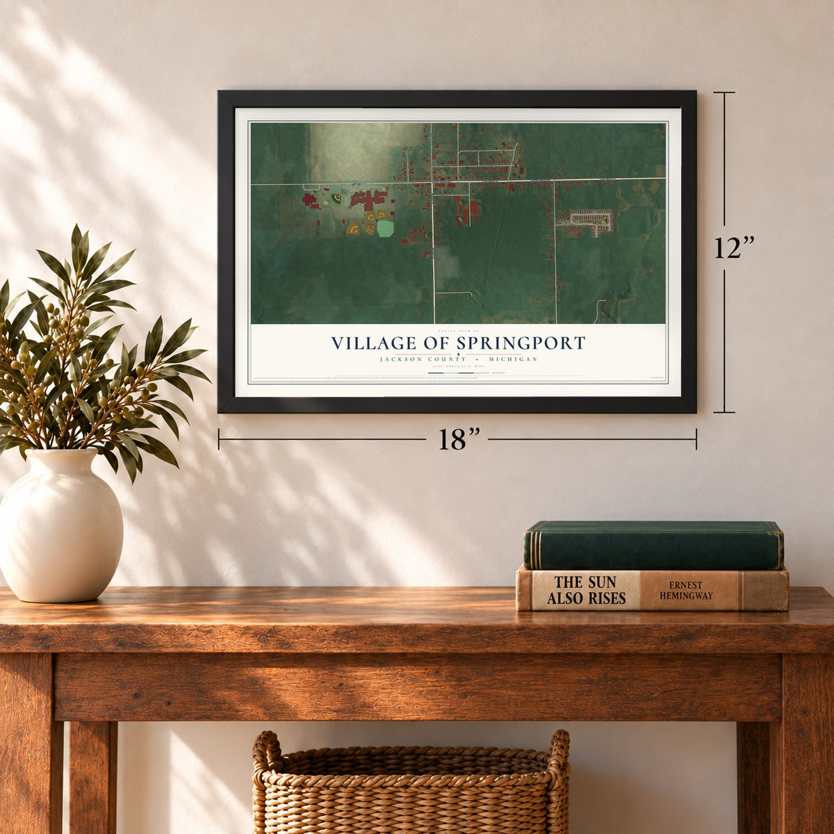 Springport, Michigan map, 12 x 18 inch print in a black frame in an entryway