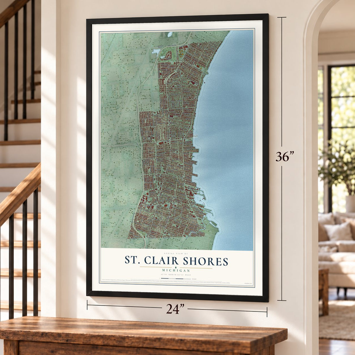 St. Clair Shores, Michigan map, 24 x 36 inch print in a black frame by a staircase