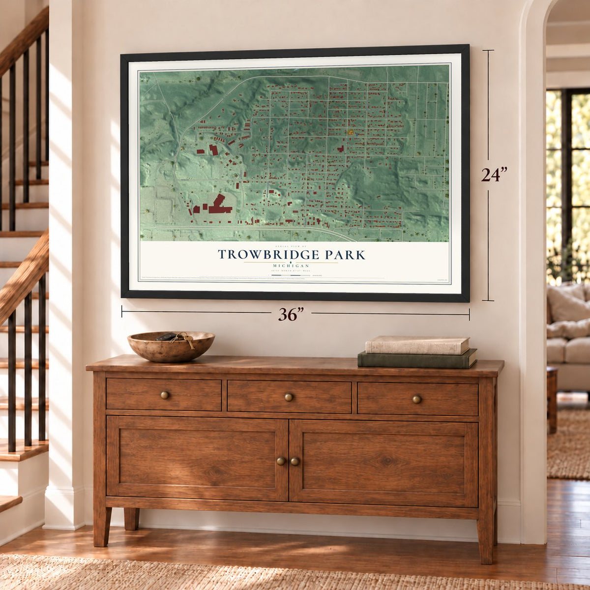 Trowbridge Park, Michigan map, 24 x 36 inch print in a black frame above a dresser by a staircase