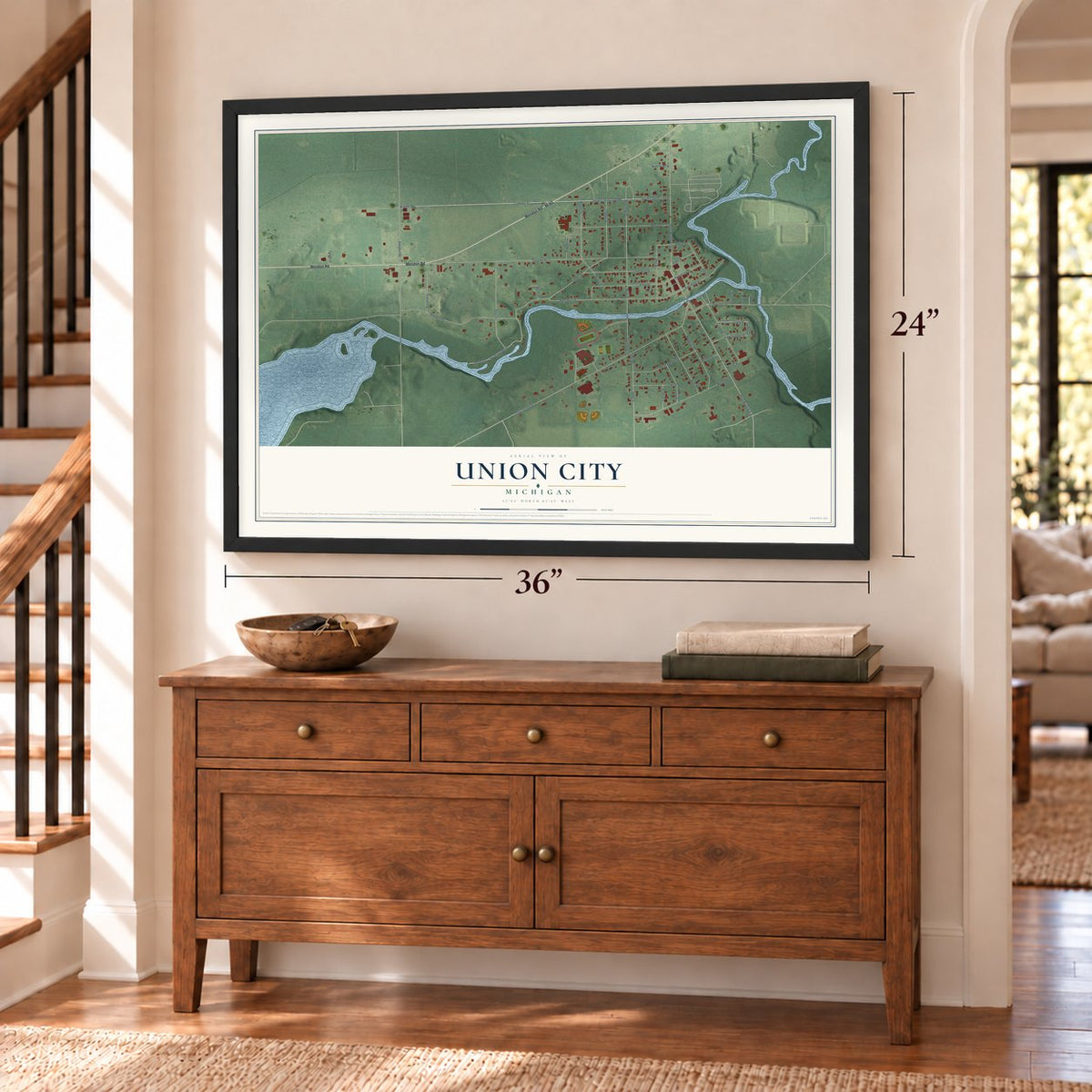 Union City, Michigan map, 24 x 36 inch print in a black frame above a dresser by a staircase