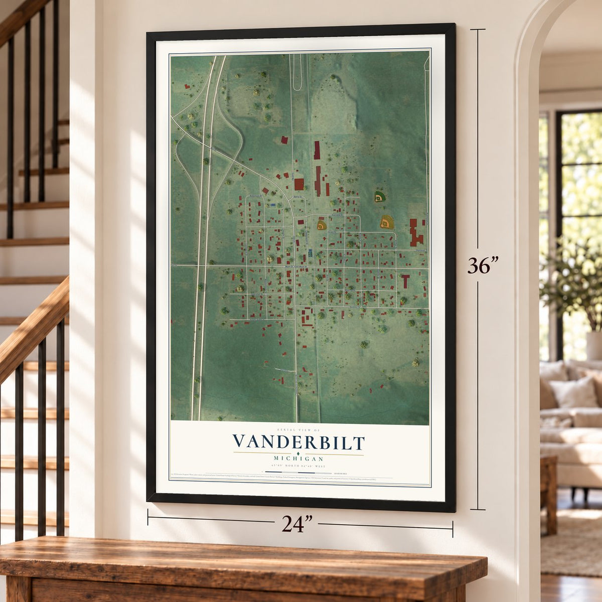 Vanderbilt, Michigan map, 24 x 36 inch print in a black frame by a staircase