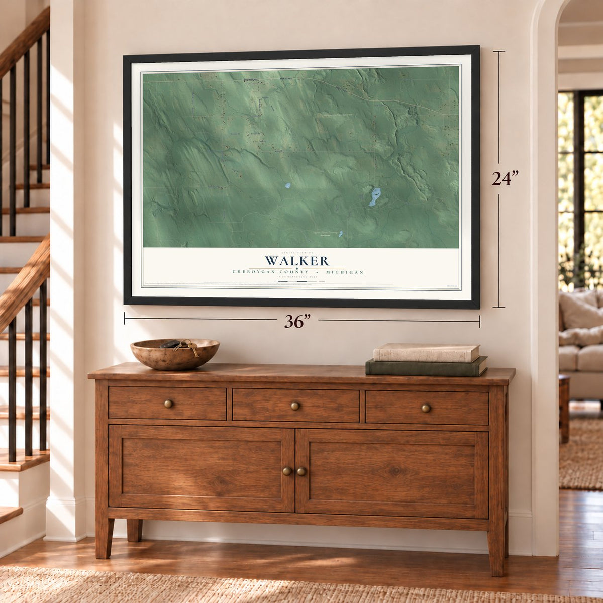 Walker, Cheboygan County, Michigan map, 24 x 36 inch print in a black frame above a dresser by a staircase