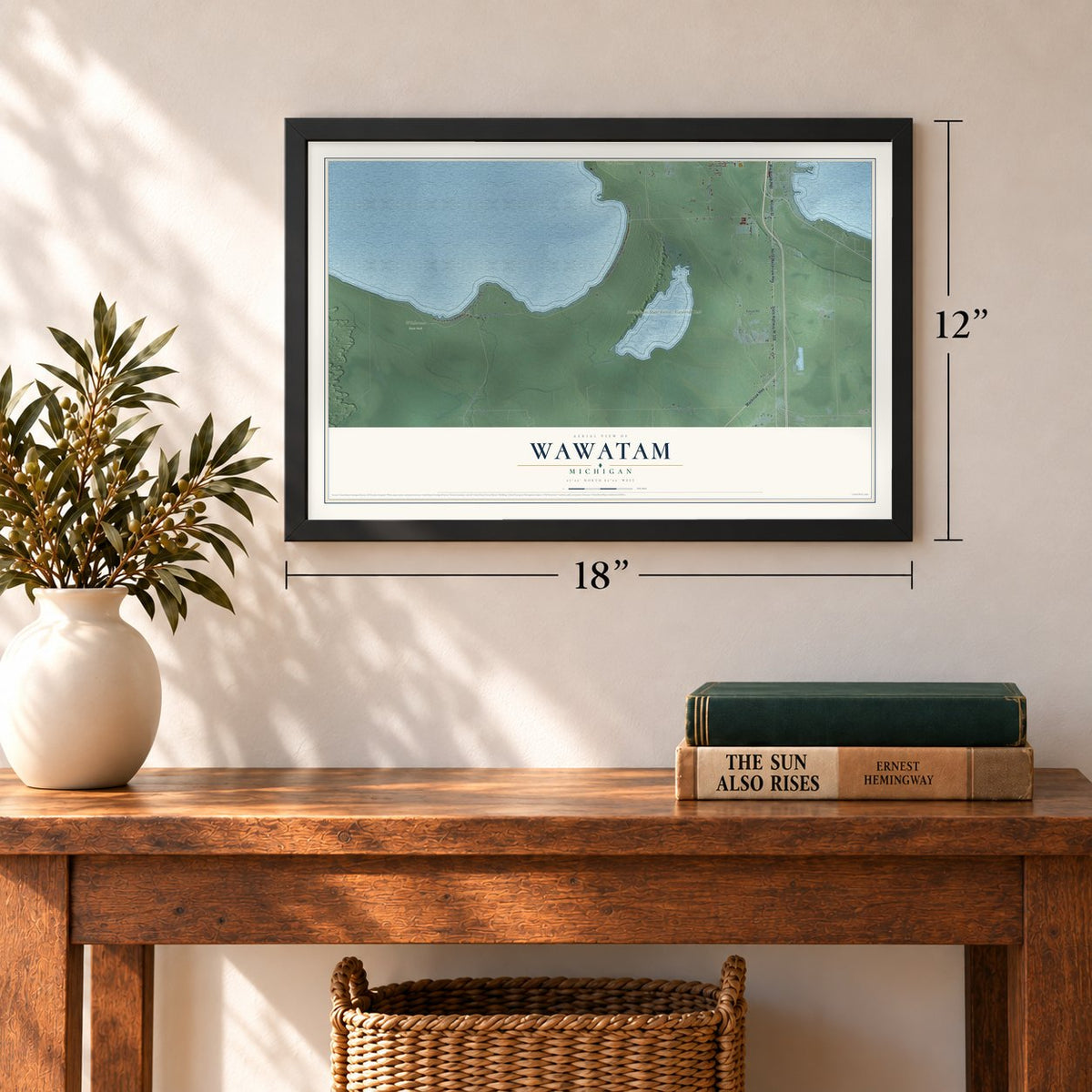 Wawatam, Michigan map, 12 x 18 inch print in a black frame in an entryway