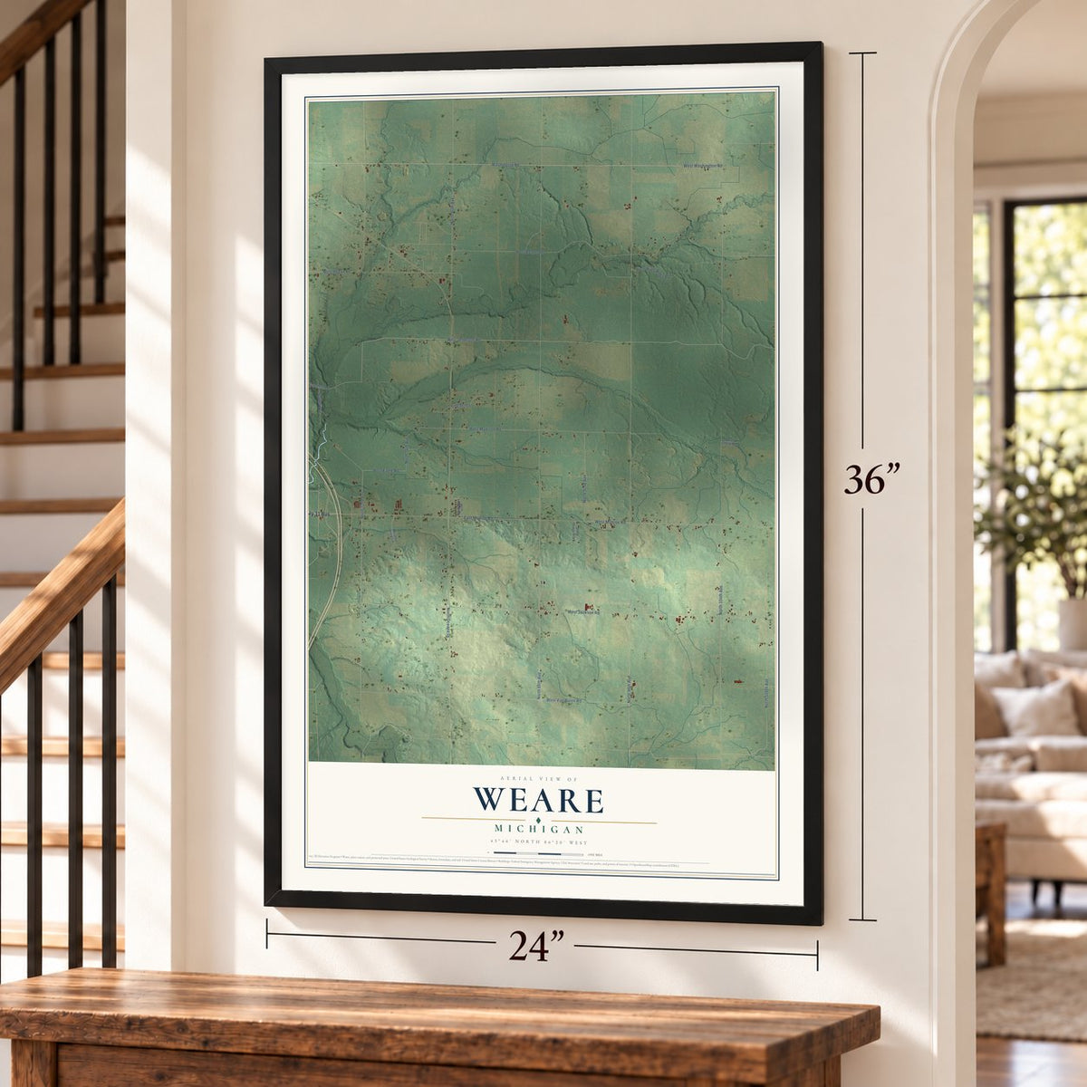 Weare, Michigan map, 24 x 36 inch print in a black frame by a staircase