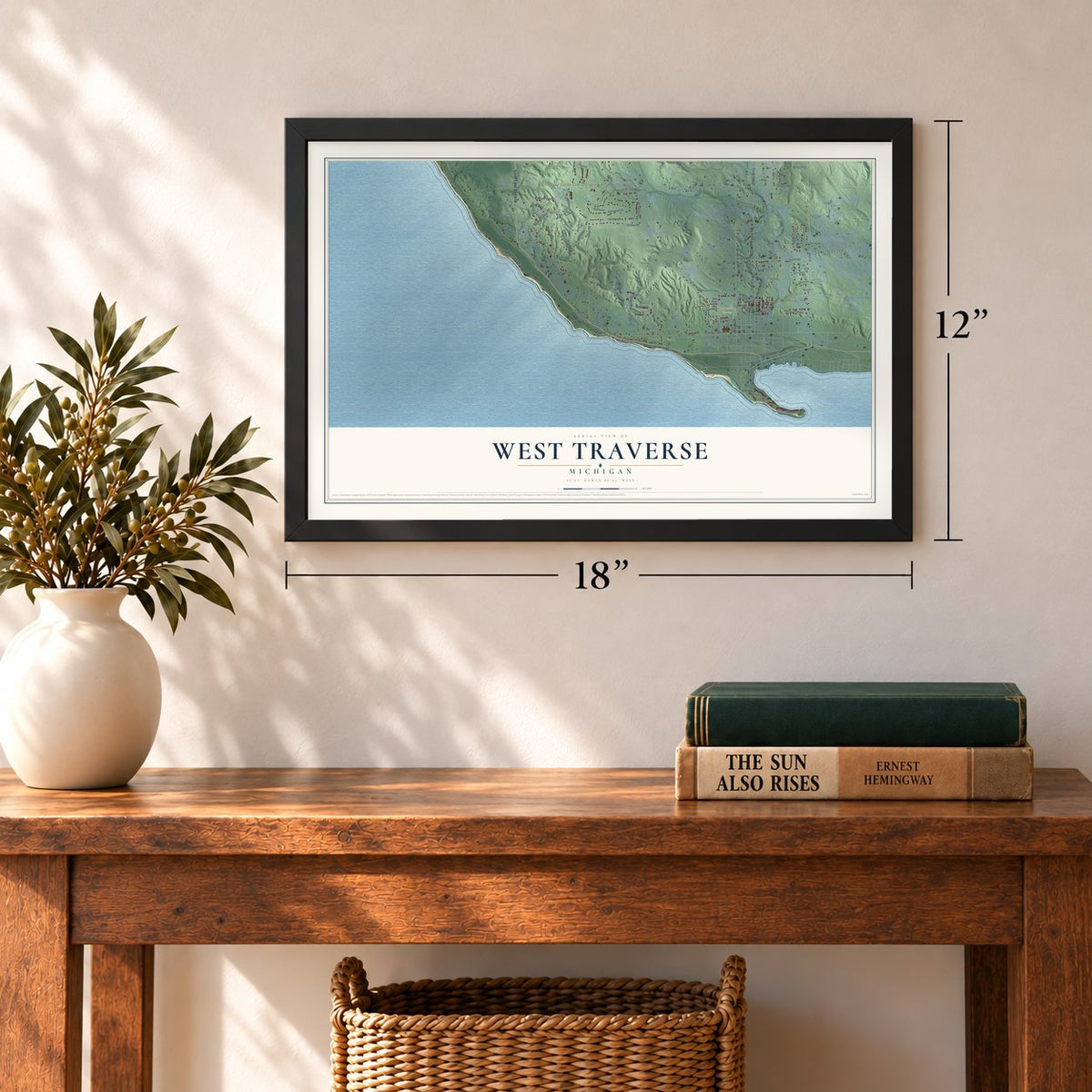 West Traverse, Michigan map, 12 x 18 inch print in a black frame in an entryway