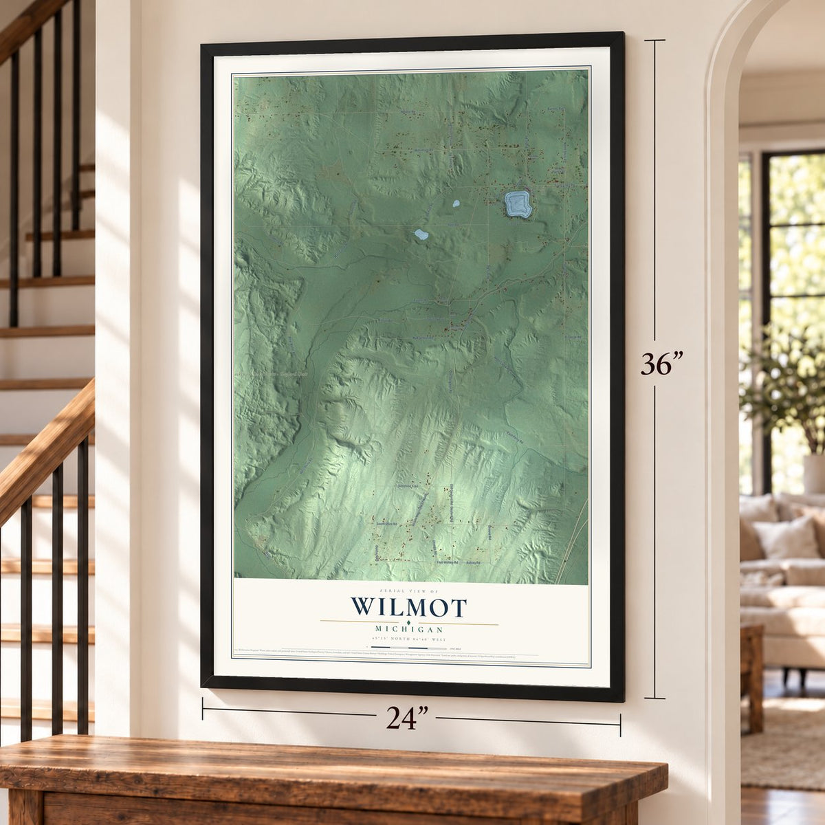 Wilmot, Michigan map, 24 x 36 inch print in a black frame by a staircase