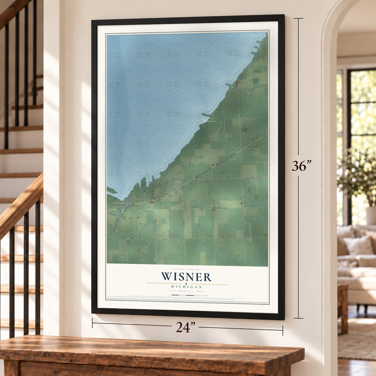 Wisner, Michigan map, 24 x 36 inch print in a black frame by a staircase