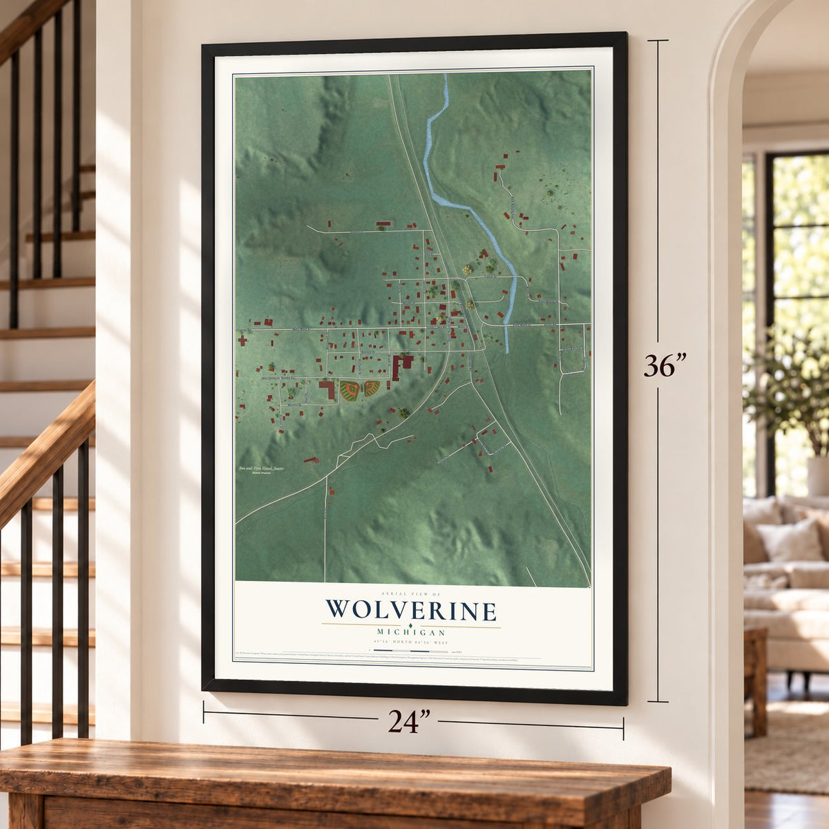 Wolverine, Michigan map, 24 x 36 inch print in a black frame by a staircase