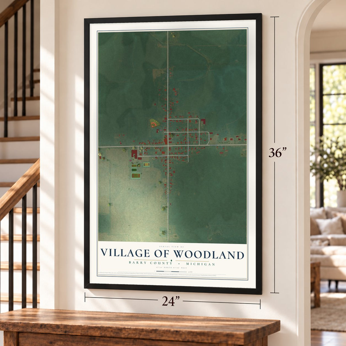 Woodland, Michigan map, 24 x 36 inch print in a black frame by a staircase
