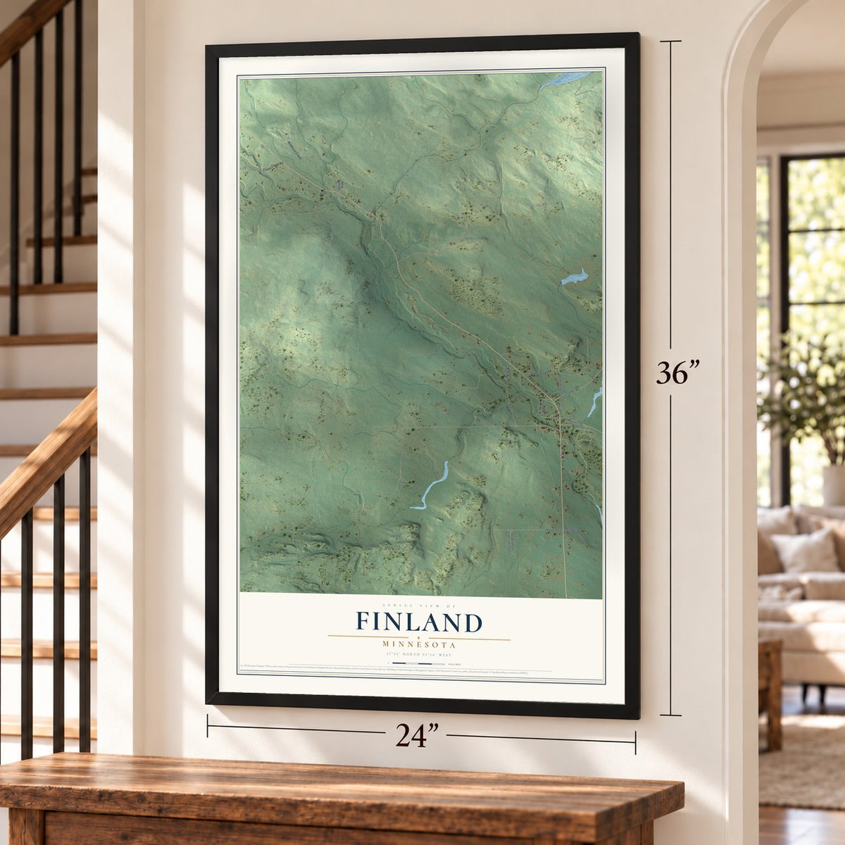 Finland, Minnesota map, 24 x 36 inch print in a black frame by a staircase