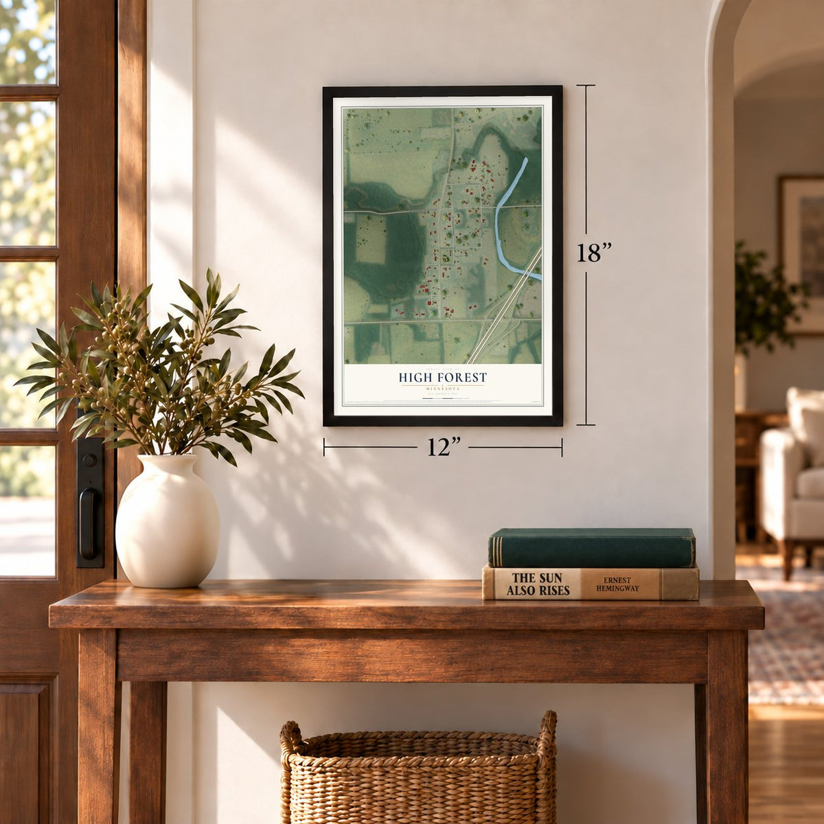 High Forest, Minnesota map, 12 x 18 inch print in a black frame in an entryway