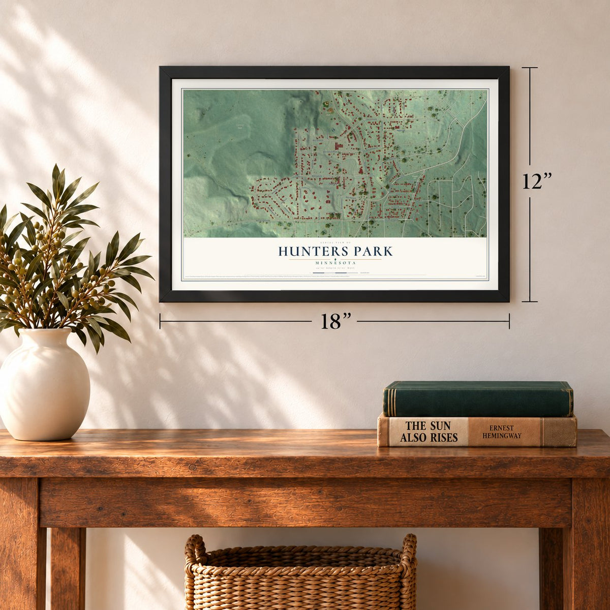 Hunters Park, Minnesota map, 12 x 18 inch print in a black frame in an entryway