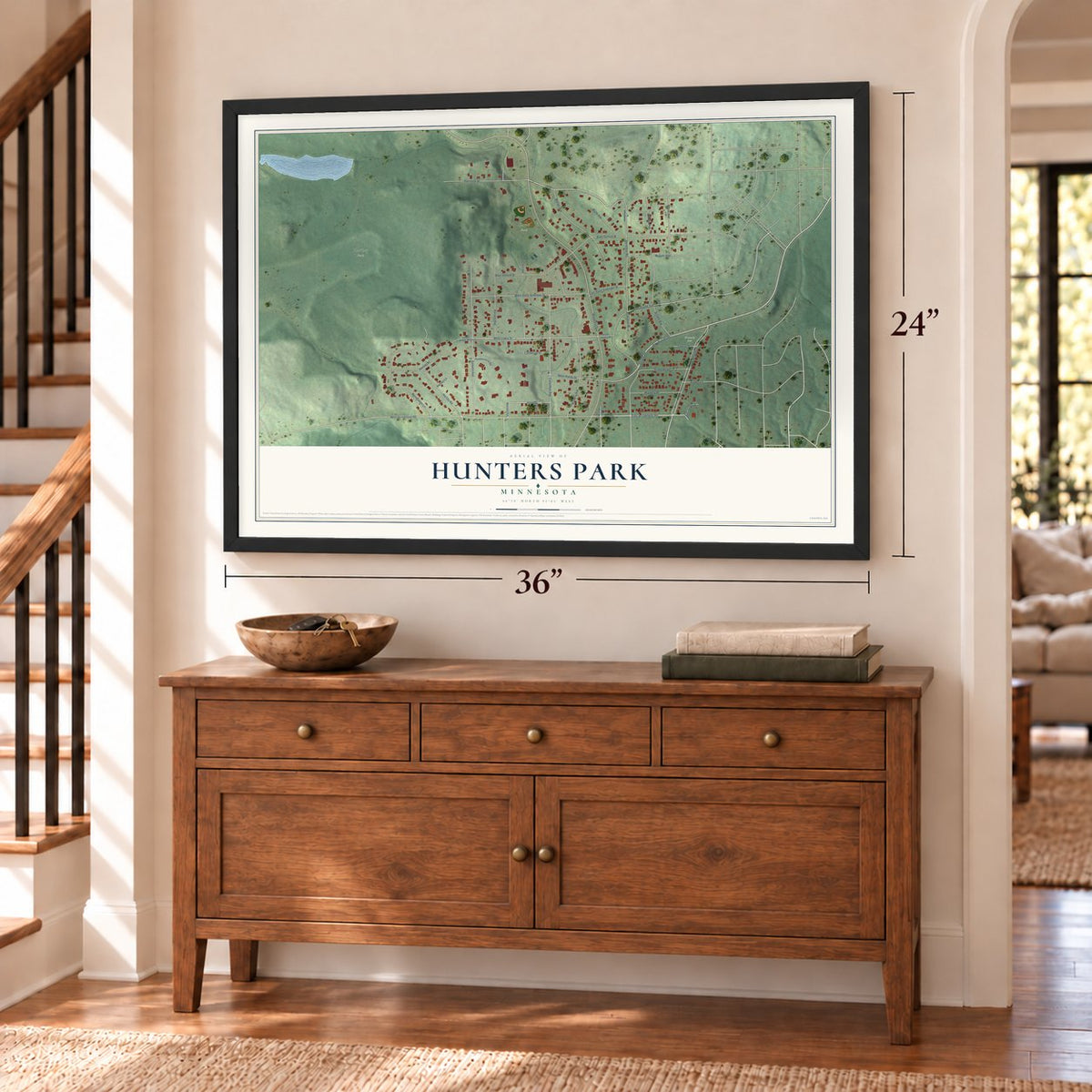 Hunters Park, Minnesota map, 24 x 36 inch print in a black frame above a dresser by a staircase