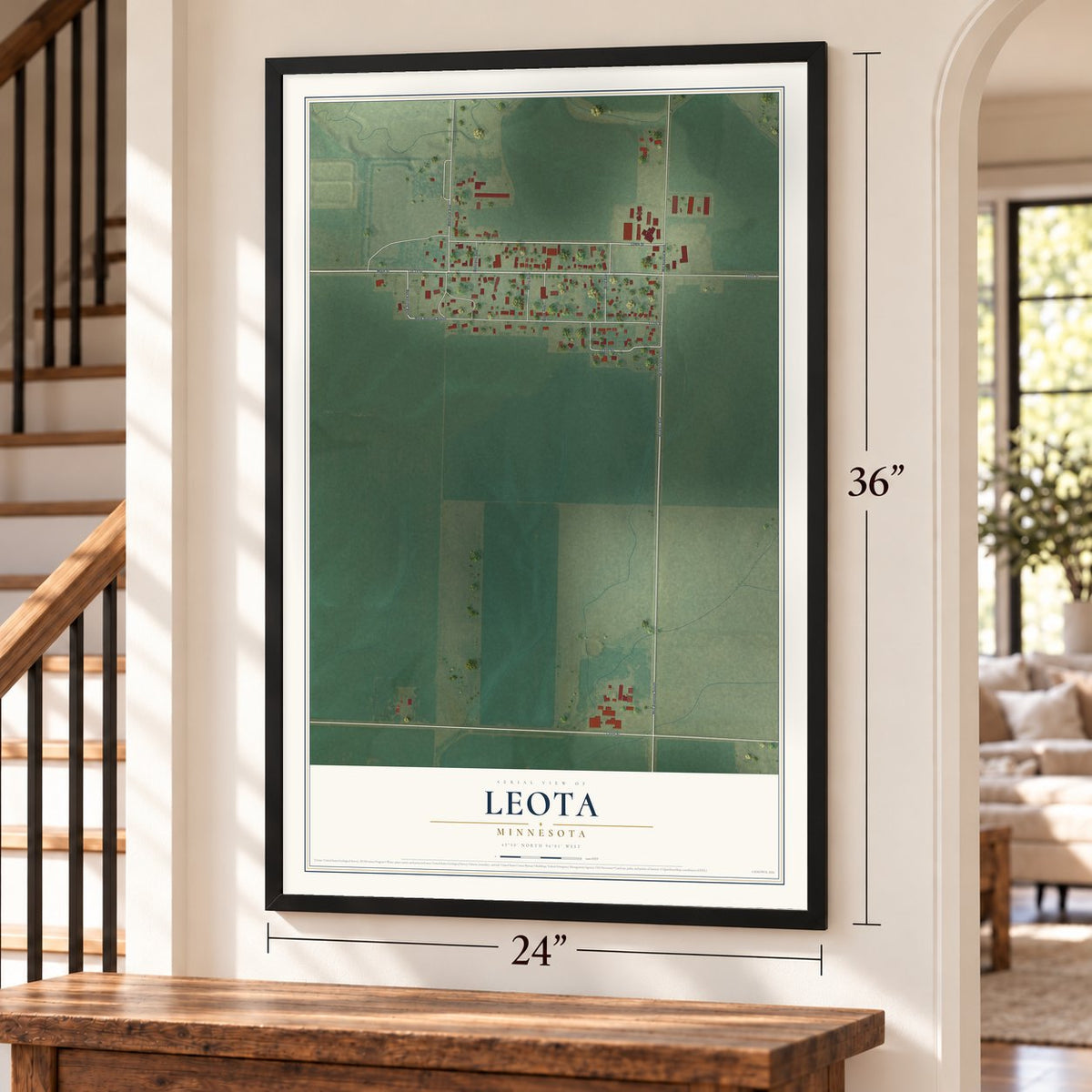 Leota, Minnesota map, 24 x 36 inch print in a black frame by a staircase