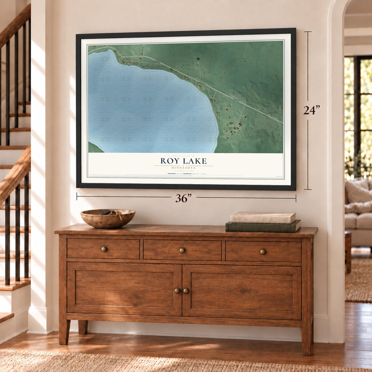 Roy Lake, Minnesota map, 24 x 36 inch print in a black frame above a dresser by a staircase