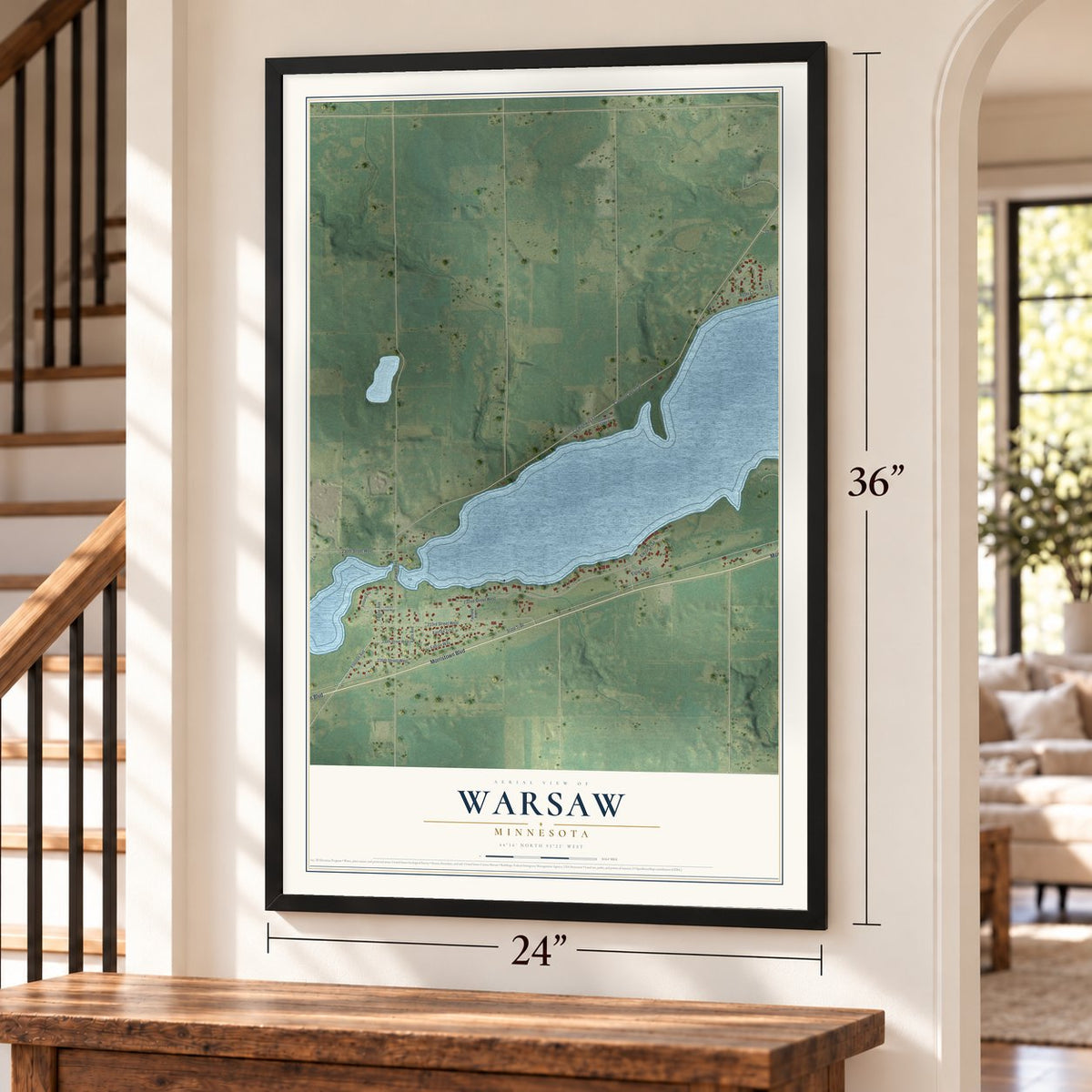 Warsaw, Minnesota map, 24 x 36 inch print in a black frame by a staircase