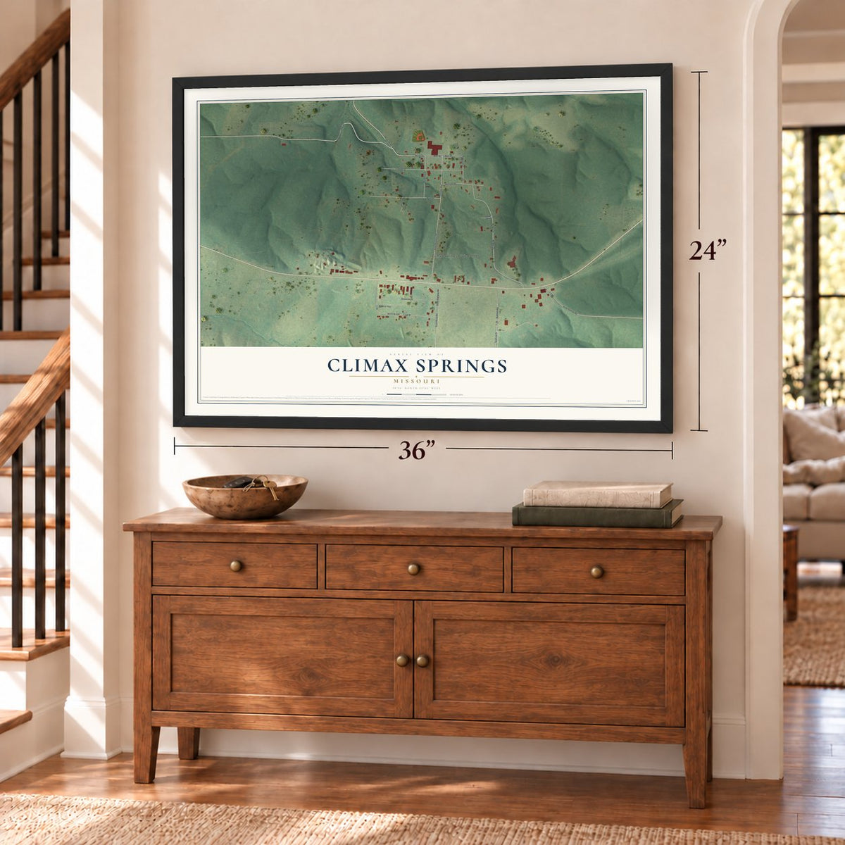 Climax Springs, Missouri map, 24 x 36 inch print in a black frame above a dresser by a staircase