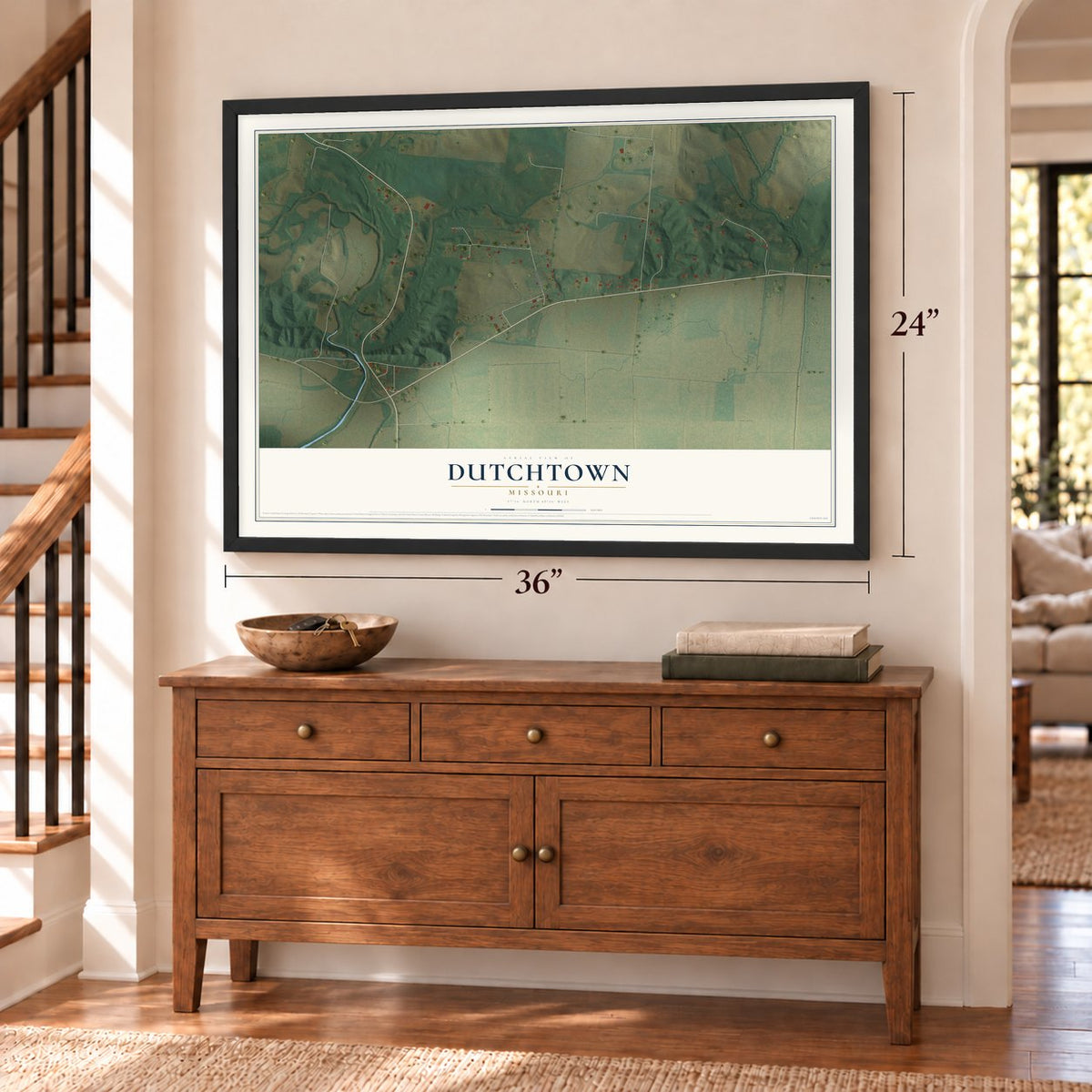 Dutchtown, Missouri map, 24 x 36 inch print in a black frame above a dresser by a staircase