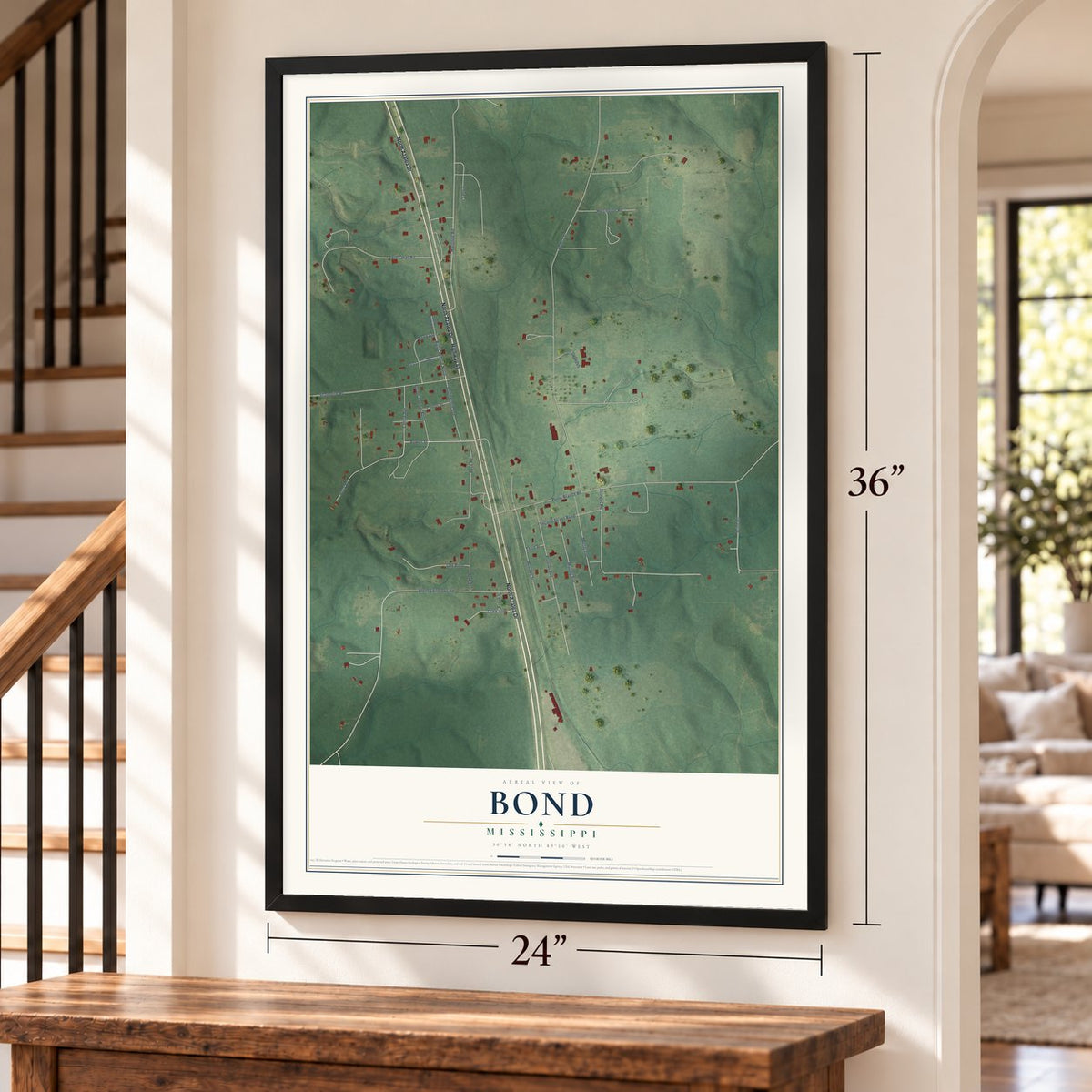 Bond, Mississippi map, 24 x 36 inch print in a black frame by a staircase