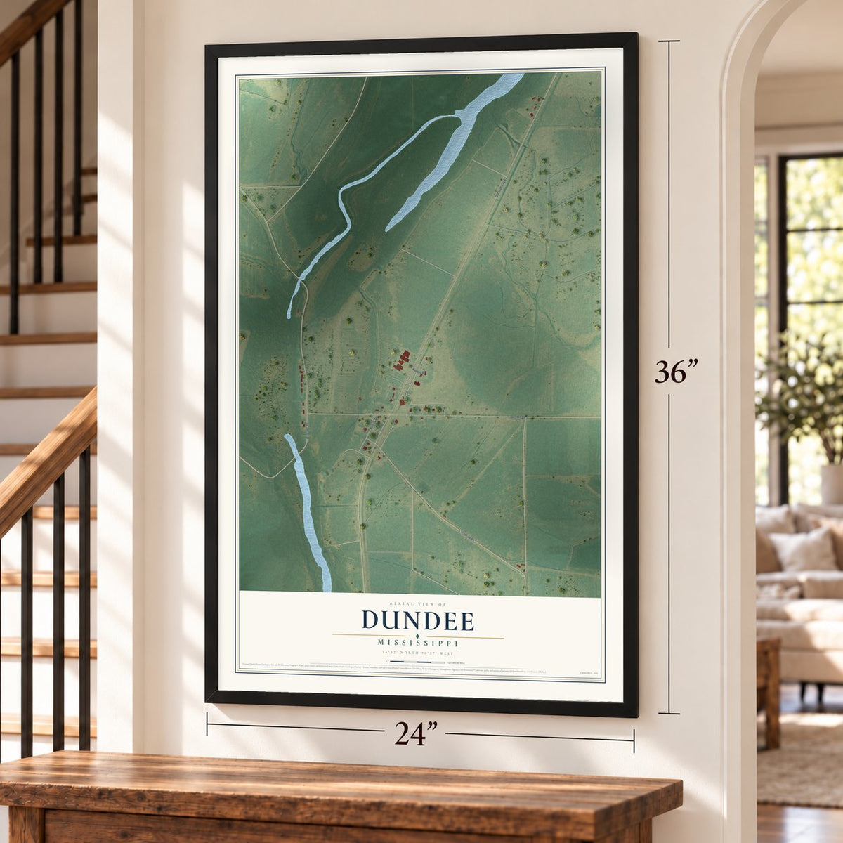 Dundee, Mississippi map, 24 x 36 inch print in a black frame by a staircase