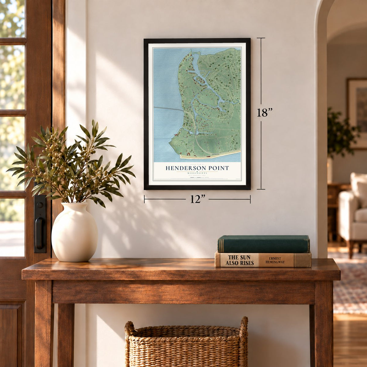 Henderson Point, Mississippi map, 12 x 18 inch print in a black frame in an entryway
