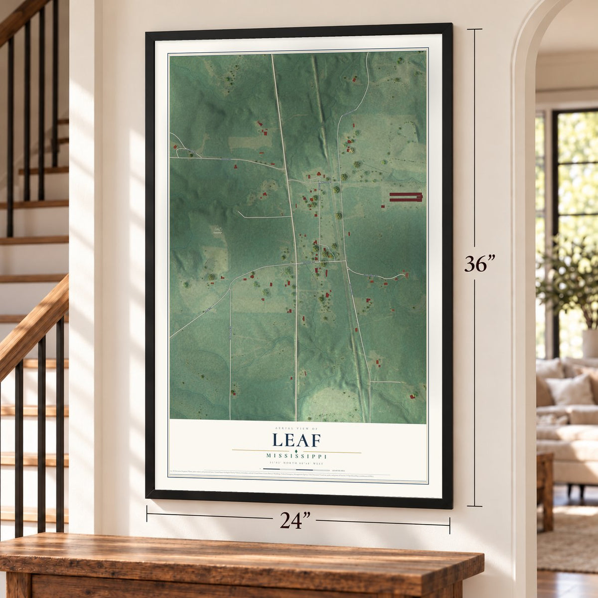 Leaf, Mississippi map, 24 x 36 inch print in a black frame by a staircase
