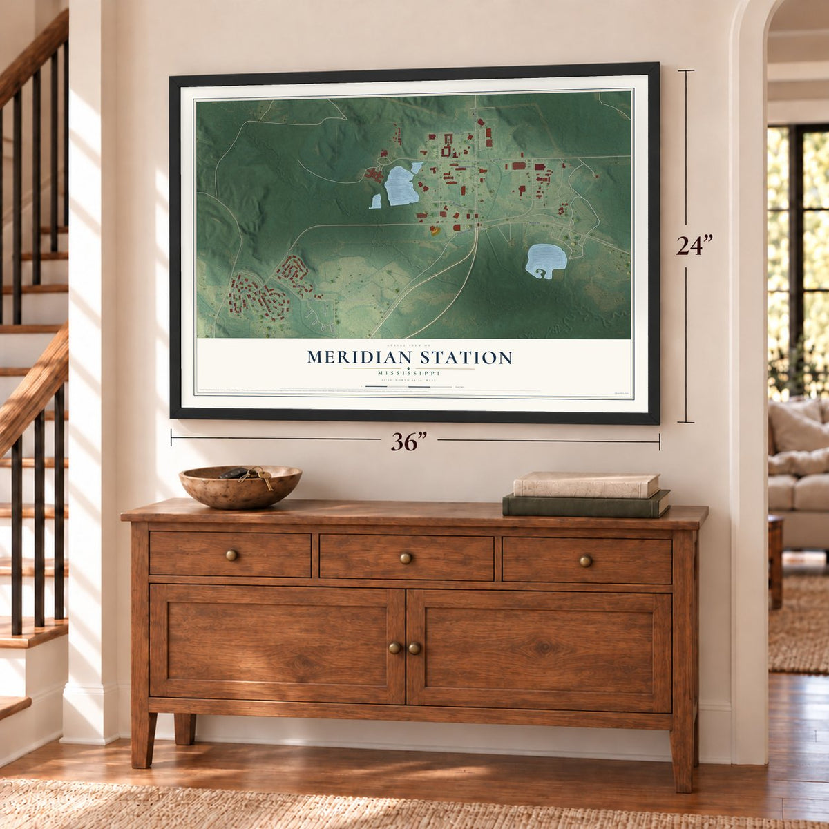 Meridian Station, Mississippi map, 24 x 36 inch print in a black frame above a dresser by a staircase