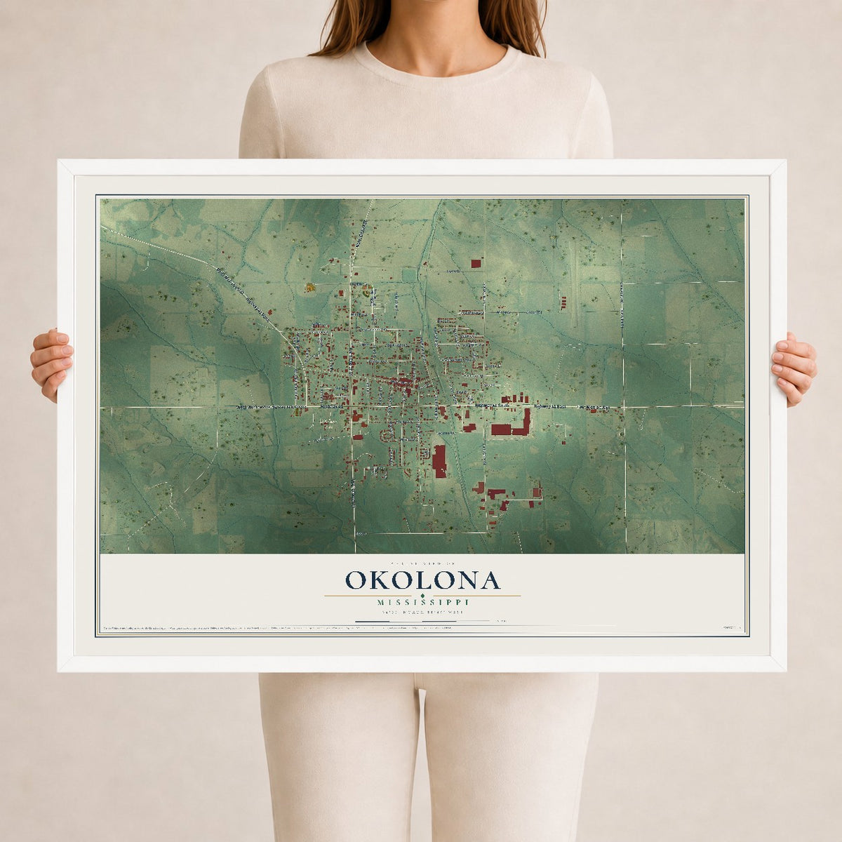 Map of Okolona, Mississippi, 24 x 36 inch print in a white wood frame